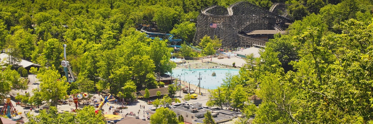 Aerial shot of Knoebles Amusement Park on a sunny day with many happy attendees